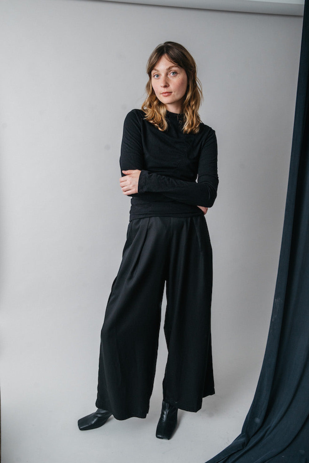Black Flared Trousers by Cossac